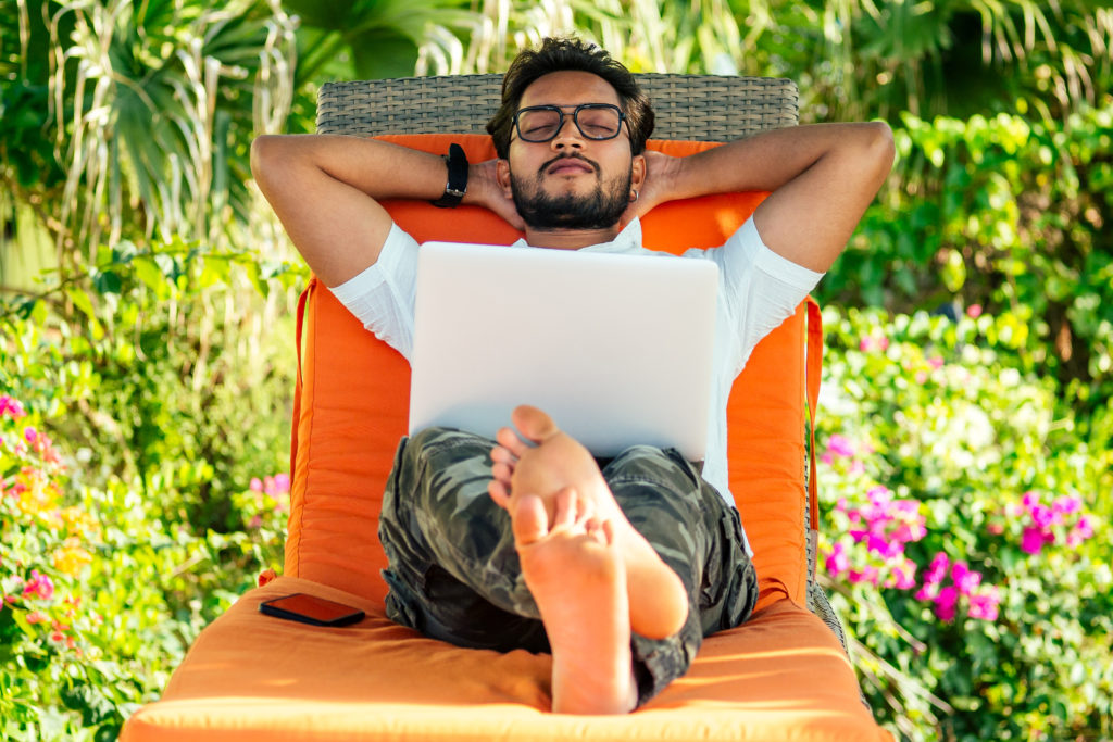 Young Male Freelancer enjoying work-life balance