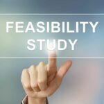 Stock Photo Of A Hand Pointing At Word Feasibility Study